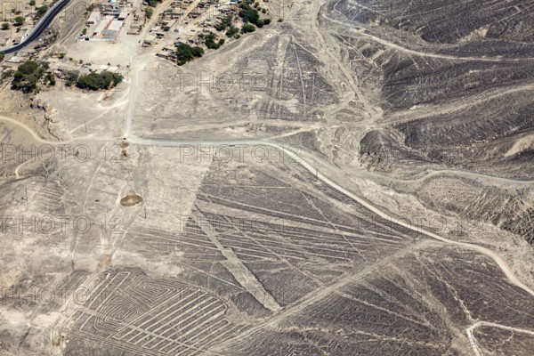 Desert landscape with visible Nazca lines seen from above in Peru, The geoglyphs and images in the desert near Nasca and Palpa in Peru