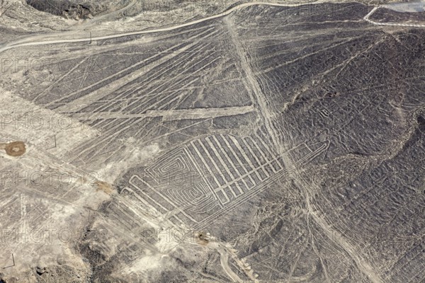Line works of art in the vast desert landscape of the Nazca region, Peru, The geoglyphs and paintings in the desert near Nasca and Palpa in Peru