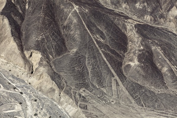 An overview of line patterns and geoglyphs in a desert region, the geoglyphs and patterns in the desert near Nasca and Palpa in Peru