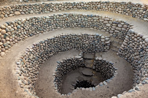 Large spiral of stones spiralling into the ground, The ancient Nazca fountains (Puquios) near Nazca, Peru