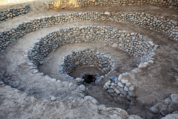 Large spiral structure of stones anchored in the earth, the ancient Nazca wells (puquios) near Nazca, Peru