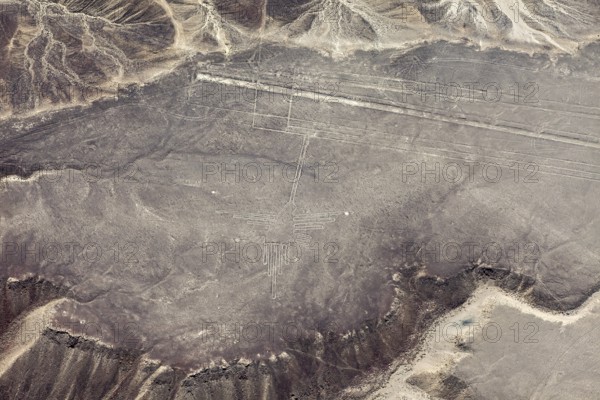 Aerial view of the Nazca Lines, with mysterious formations etched into the desert, the geoglyphs and images in the desert near Nasca and Palpa in Peru