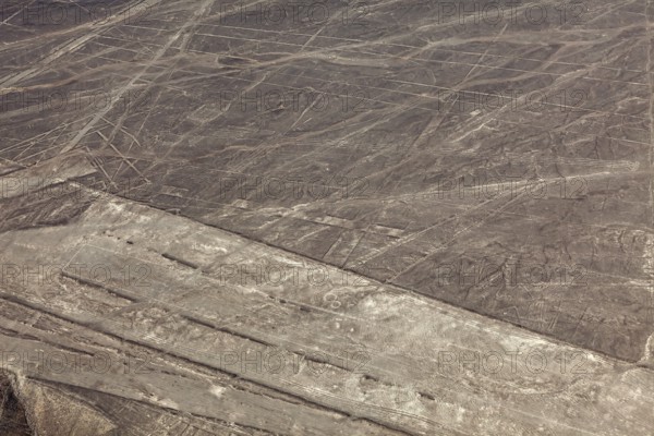 Dry desert area with the Nazca lines and simple geometric patterns, the geoglyphs and drawings in the desert near Nasca and Palpa in Peru