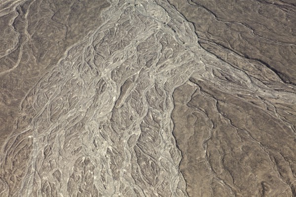Detailed view of a desert-like landscape created by erosion, The desert landscape near Nasca in Peru