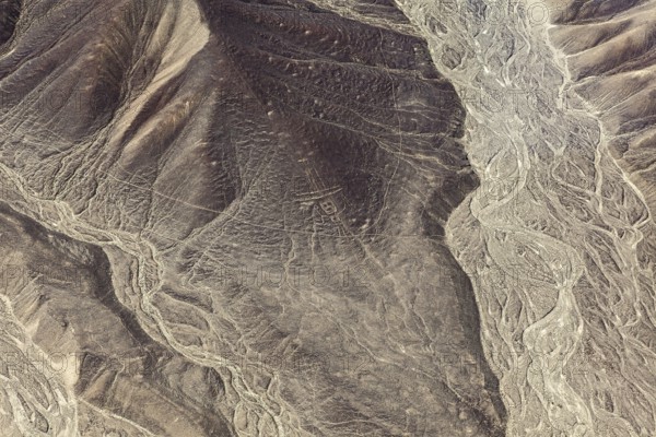 Detailed lines and patterns on a geologically distinctive desert area, the geoglyphs and drawings in the desert near Nasca and Palpa in Peru