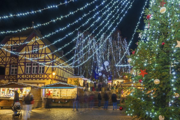 Christmas market, night view, Riquewihr, Grand Est, Haut-Rhin, Alsace, France