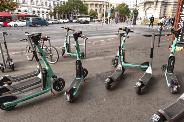 Budapest, Hungary. October 1st 2023 A group of Swap rental scooters parked on the pavement in central Budapest, Hungary