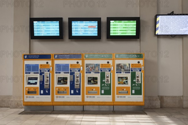 Budapest, Hungary. October 1st 2023 Automatic ticket machines and time table display screens at Nyugati Palyaudvar rail station in Budapest, Hungary