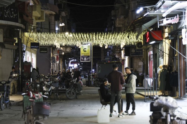Syrians shop at the historic Al-Hamidiyah Bazaar adjacent to the Umayyad Mosque during the early days of Ramadan in Damascus, Syria on February 18, 2026, Damascus, Syria