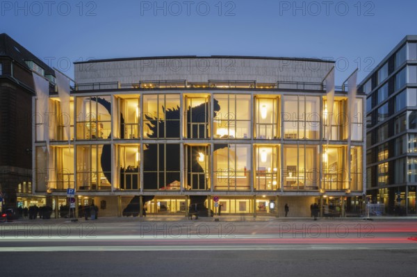 Hamburg State Opera (with Monster's Paradise façade) at blue hour with illuminated stripes of vehicles in the foreground, Hamburg, Germany
