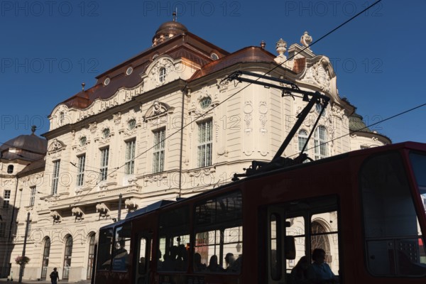 Bratislava, Slovakia. October 2nd 2023 A tram passing the beautiful Baroque era Reduta Bratislava concert hall, home of the Slovak State Philharmonic, Slovakia