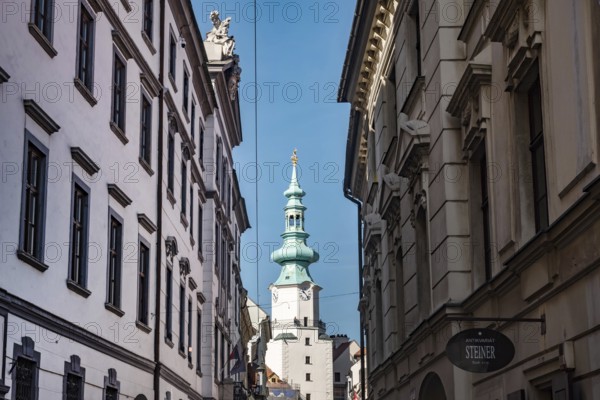 Bratislava, Slovakia. October 2nd 2023 Scenic view of Michaels Gate, iconic landmark of narrow pedestrian only streets of the Old Town of Bratislava, Slovakia