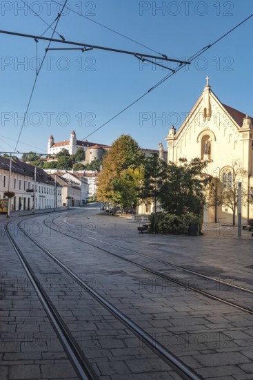 Bratislava, Slovakia. October 2nd 2023 Bratislava Castle overlooking the Little Carpathians above the Danube River, from Zupne Namestie Square in the Old Town of Bratislava, Slovakia