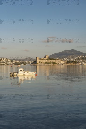 Bodrum, Mugla, Turkey. April 21st 2022 Beautiful morning light on Bodrum harbour with a medieval fortress and mountains in the background, Turkish south west Aegean Coast, Turkey