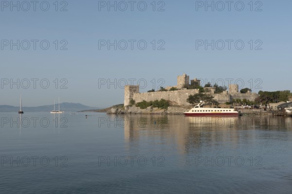 Bodrum, Mugla, Turkey. April 22nd 2022 Beautiful seascape view of Bodrum Castle with Yachts in the harbour of the Aegean Sea, south west Turkish coastline, Turkey