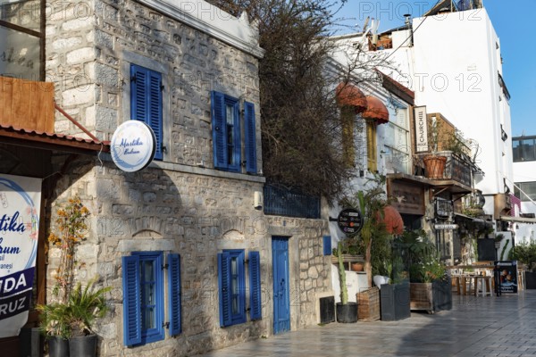 Bodrum, Turkey. April 23rd 2022 Shops, Bars and Restaurants on a pretty street in the popular Turkish seaside town of Bodrum, Mugla, Gulf of Gokova, Turkey