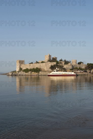 Bodrum, Turkey. April 22nd 2022 Beautiful Bodrum Castle and seaside harbour on the southwest turquoise coast of Turkey, popular holiday town with foreign tourists and Turkish visitors