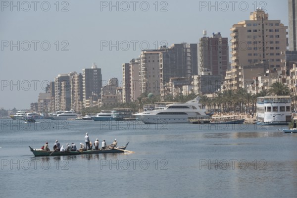 Rosetta, Egypt. June 27th 2024 Egyptian fishermen bringing their catch back to the city of Rashid or Rosetta in the Nile Delta region of Northern Egypt