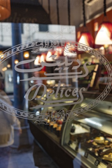 Alexandria, Egypt. December 4th 2022 Entrance to Délices Patisserie Alexandria, serving Middle Eastern food alongside pastries, cakes & coffee, one of the most popular historical cafes near the Alexandria seafront, Egypt