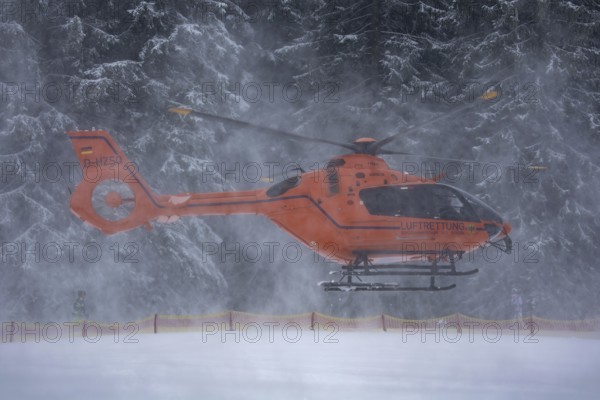 Air rescue helicopter (Federal Ministry of the Interior) in action in the Oberjoch ski resort (Bavaria)