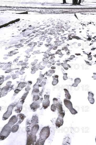 Traces of passers-by in snow, winter, Germany
