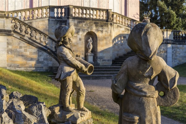 Fassan castle with fountain figures in the foreground, Moritzburg, Saxony, Germany