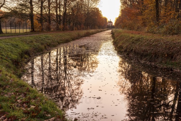 On the canal, visual axis to the pheasant castle in morning light, Moritzburg Castle Park, Saxony, Germany