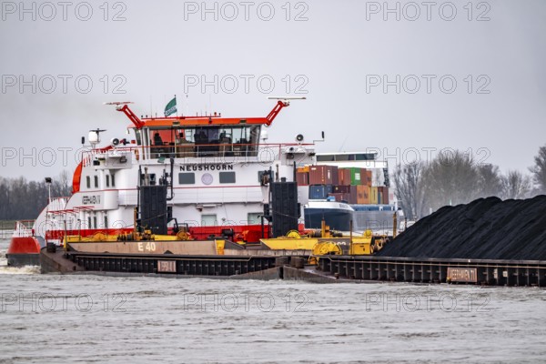 Veerhaven-4 push association with coal for the coking plant of Hüttenwerke Krupp-Mannesamnn, HKM, in Duisburg, behind container freighter sensation both ships are of Dutch origin, on the Rhine near Xanten, North Rhine-Westphalia, Germany