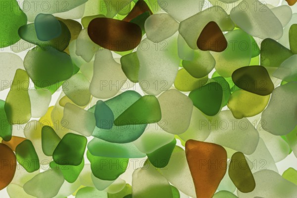 Colourful broken glass cut by the sea, sea glass, sea glass, beach glass, from the North Sea