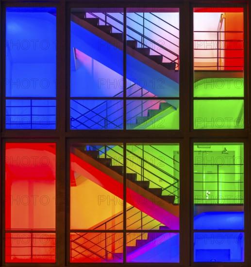 View through the windows of a brightly lit staircase. Frankfurter Mainova AG building, city center, Frankfurt am Main, Hesse, Germany