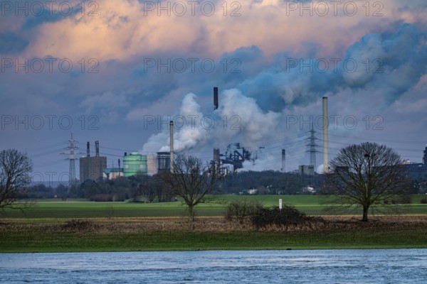 Hüttenwerke Krupp-Mannesmann, HKM in Duisburg-Hüttenheim, 2 blast furnaces, coking plant, extinguishing cloud, on the left the gas power plant, cooling towers, Rheinauen in Duisburg-Mündelheim, North Rhine-Westphalia, Germany