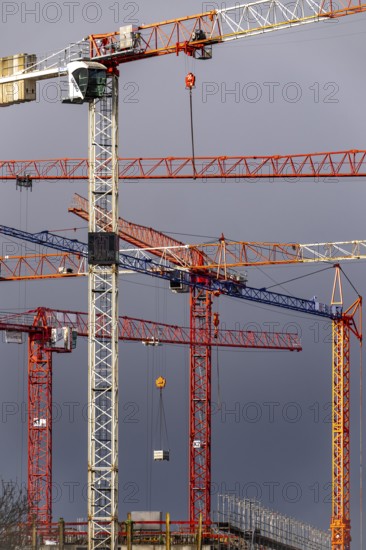 Construction cranes on 2 large construction sites Wohnbau, Geschäftsgebäude, Krefeld North Rhine-Westphalia, Germany