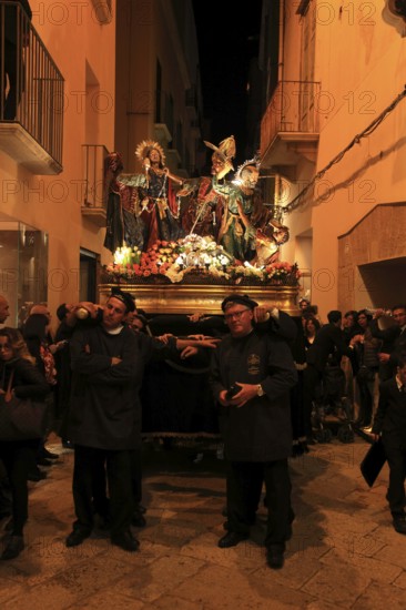 Sicily, old town of Trapani, Good Friday mystery procession La Processione dei Misteri, procession with the mysteries, through the alleys of the old town at night, scenes from the Passion of Christ
