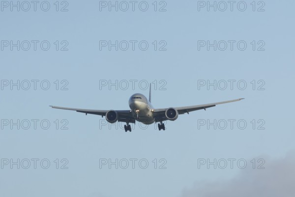 Boeing 777 A7-BFL commercial jet aircraft of Qatar cargo in flight on approach to land at London Stansted airport, Essex, England, United Kingdom
