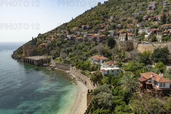 Alanya, Turkey. April 7th 2021 Beautiful view of Alanya peninsular and the old Shipyard and castle walls from the harbour
