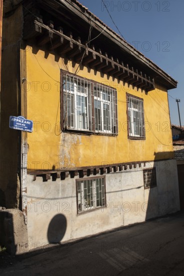 Ankara, Turkey. November 17th 2020 An old yellow painted house in the quiet streets of Ankara Castle, Turkey