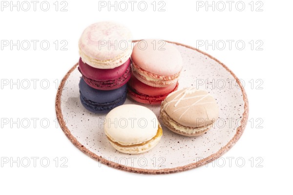 Macarons colourful cookies dessert isolated on white background, close up, side view