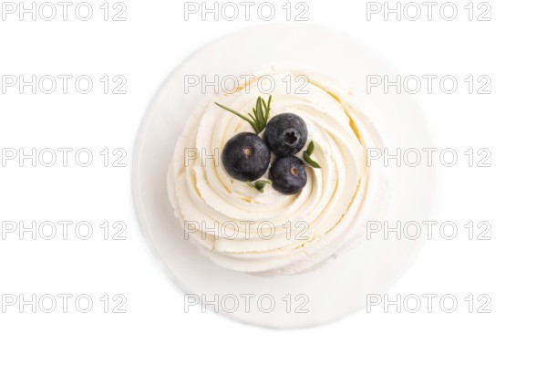 Pavlova Meringue dessert with crisp meringue and blueberry Isolated on white background, close up, top view, flat lay