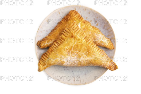 Triangles Pie, Puff Pastry, Samsa with cherry jam isolated on white background, top view, flat lay, close up