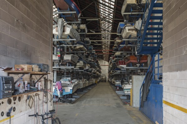 Motor boat warehouse in a port on the island of Giudecca, Venice, Veneto, Italy