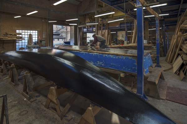Gondola building in a shipyard, Guidecca, Veneto, Italy