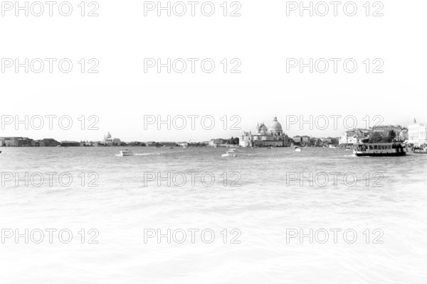 Santa Maria Salute seen from the water, black and white, Venice, Veneto, Italy