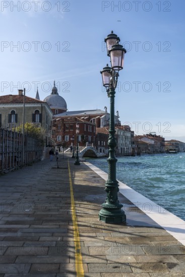 Quay overlooking Chiesa del Santissimo Redentore Church of the Most Holy Redeemer, on Guidecca Island, Venice, Veneto, Italy