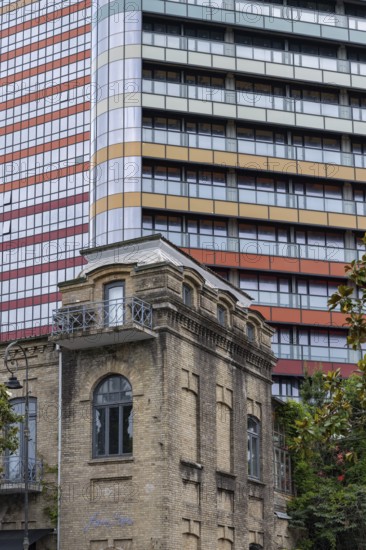 Batumi, Georgia. July 21st 2025. Old traditional style Georgian architecture and modern skyscraper apartment buildings in Batumi on the Black Sea coast of Georgia