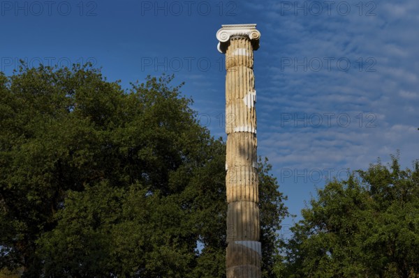 Victory Column of Nike, Single Stone Column with Capital against a Blue, Cloudy Sky, Archaeological Site, Ancient Olympia, Olympia, Peloponnese, Greece