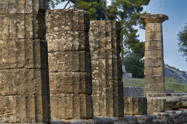 Temple of Hera, Temple of Hera, Heraion, Massive Ancient Stone Columns in a Ruined Landscape with Adjoining Hill, Archaeological Site, Ancient Olympia, Olympia, Peloponnese, Greece