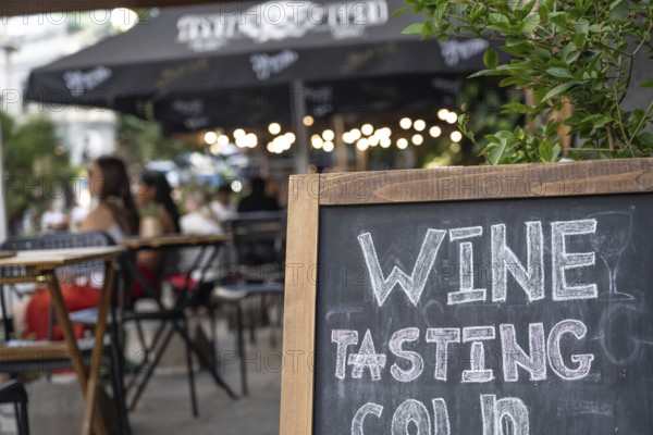 Tbilisi, Georgia. September 12th 2025 Georgian wine tasting sign outside a wine bar café in the Old Town of Tbilisi, Georgia