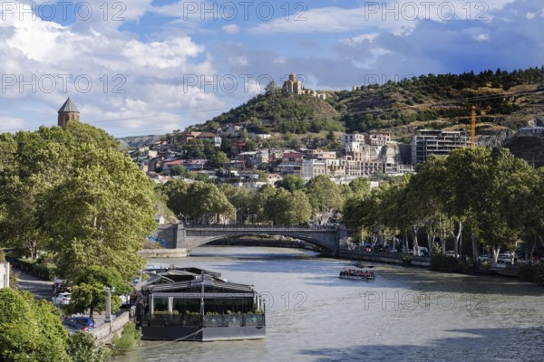 Tbilisi, Georgia. September 12th 2025 Summer landscape view of the Mtkvari or Kura River in the center of Tbilisi, Georgia