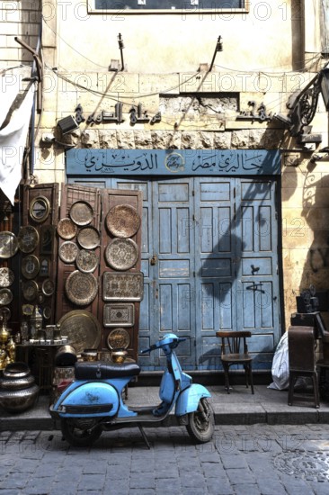 Cairo, Egypt. April 15th 2025. A cool looking blue Vespa style motor scooter, a popular mode of transportation in Cairo, with its busy congested streets the motor scooter is often the preferred way of getting around. Egypt