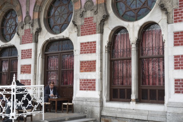 Istanbul, Turkey. January 3rd 2025. A man drinks tea in a café at the historical Sirkeci Railway Station, famous as the terminus of the Orient Express